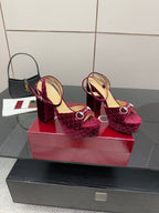 Purple velvet platform sandals on block heels with two-part ankle strap