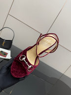 Purple velvet platform sandals with ankle straps and silver ring hardware