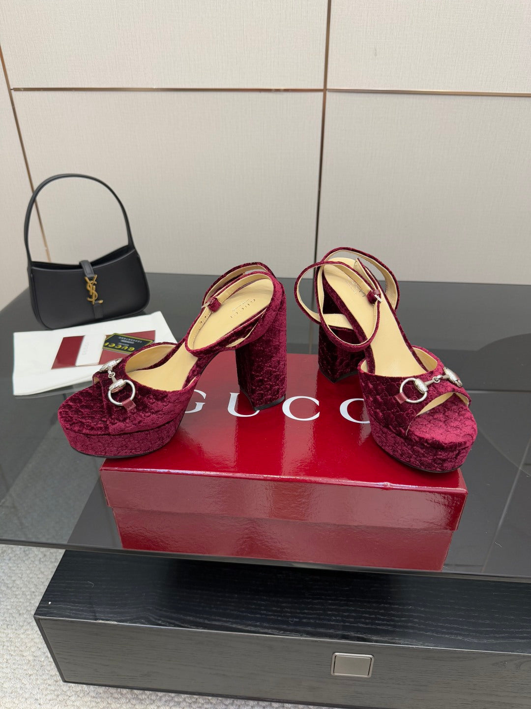 Purple velvet platform high-heel sandals with circular silver buckle on strap