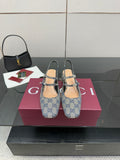 Blue GG monogram flats with bow buckle and slingback strap, low heel