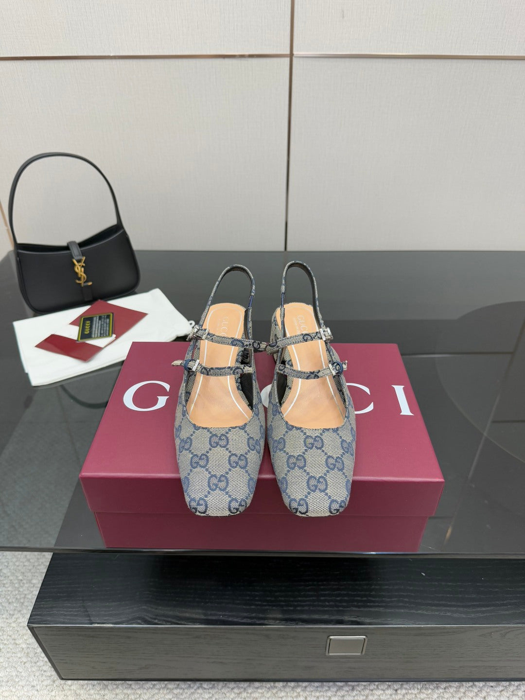 Blue GG monogram flats with bow buckle and slingback strap, low heel