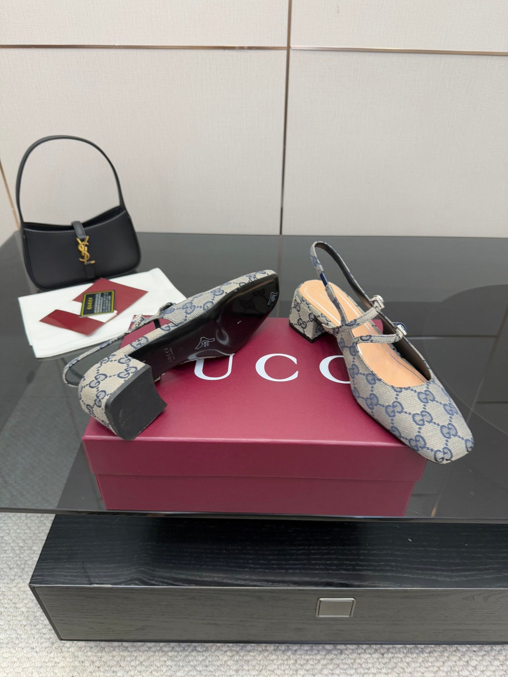 Blue GG monogram flats with bow buckle and slingback strap, side profile