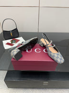 Blue GG monogram flats with bow buckle and slingback strap, side profile