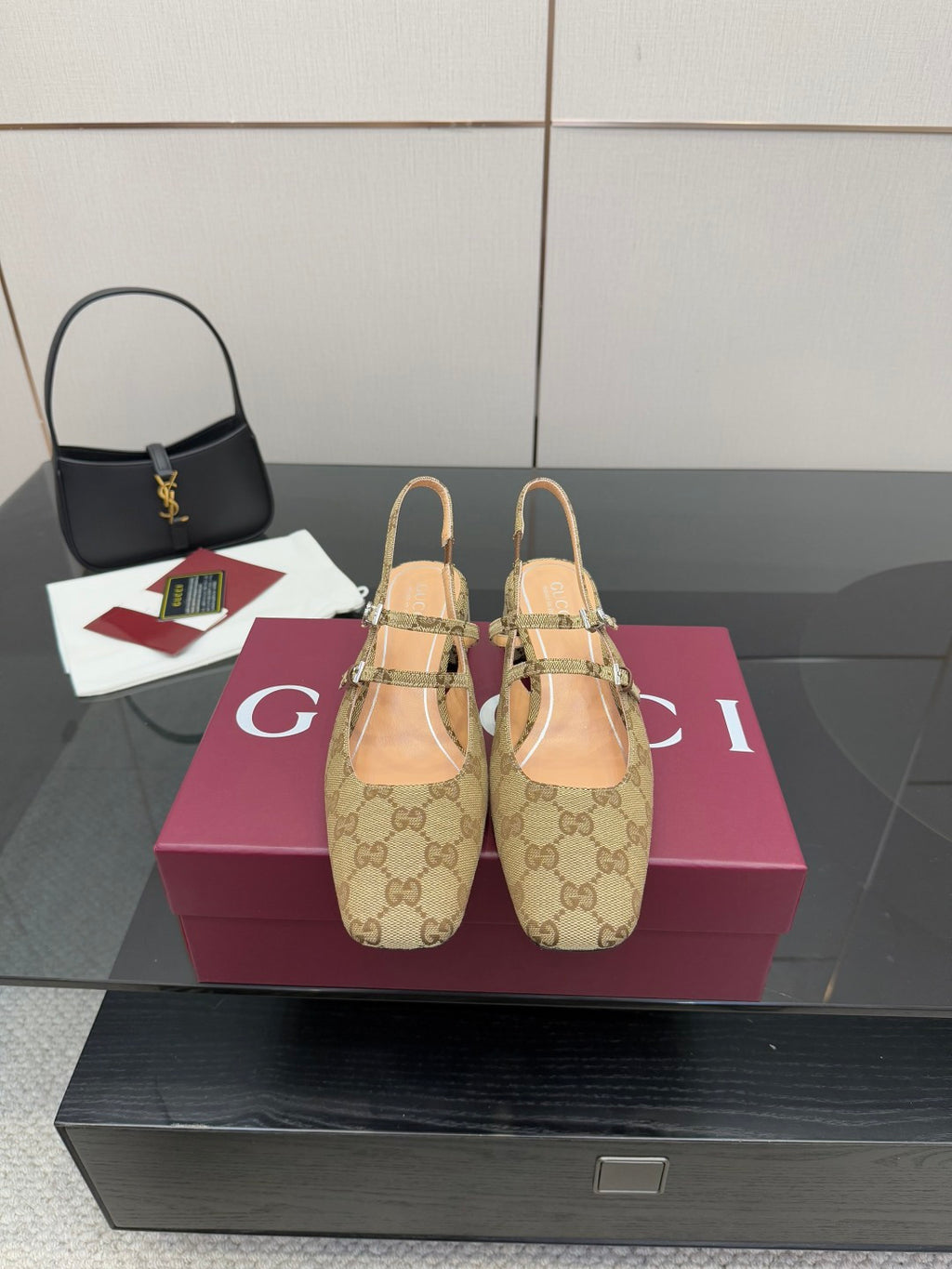 Gucci GG-pattern heeled mule with gold buckle straps, pointed toe
