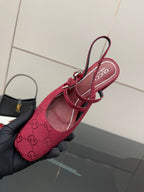 Gucci ladies slingback pumps, pink logo fabric, showing footbed and ankle strap.