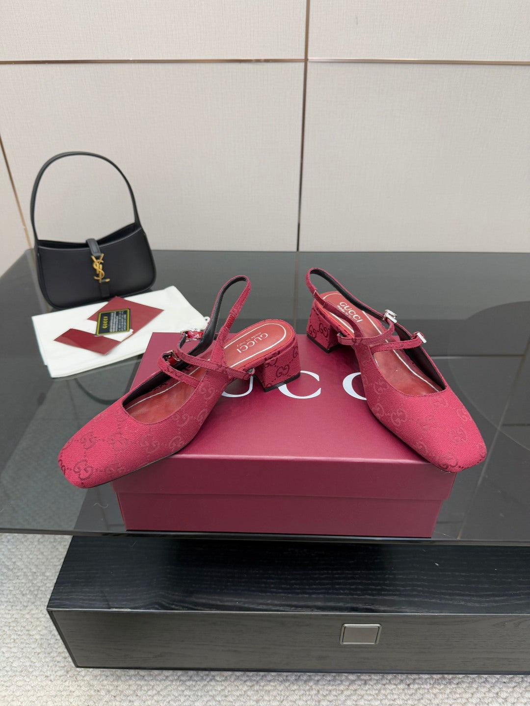 Gucci ladies slingback pumps, pink logo print, open top with ankle strap.