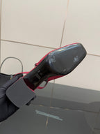 Gucci ladies slingback pumps, pink logo print sole view with block heel base.