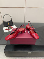 Gucci women’s red patent heels with metallic buckle strap and block heel