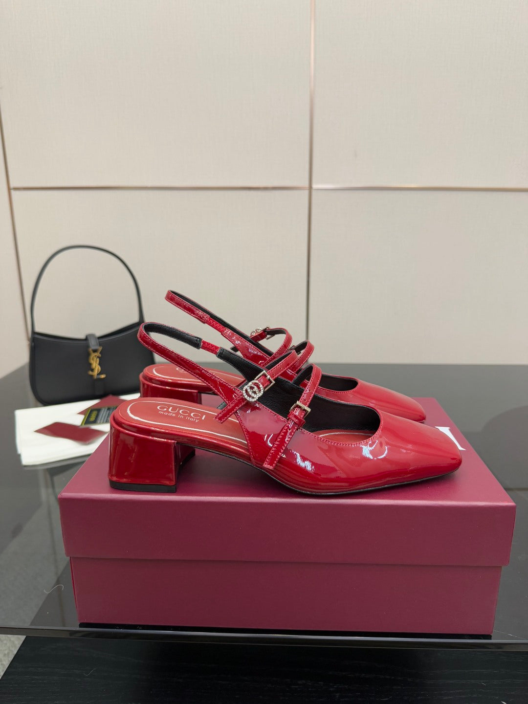 Gucci women’s red patent heels, slingback strap and chunky block heel