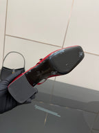 Gucci women’s red patent heels, black sole and red trim underside