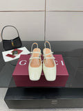 Gucci ladies' white slingback shoes with pointed toe, jeweled strap, block heel.