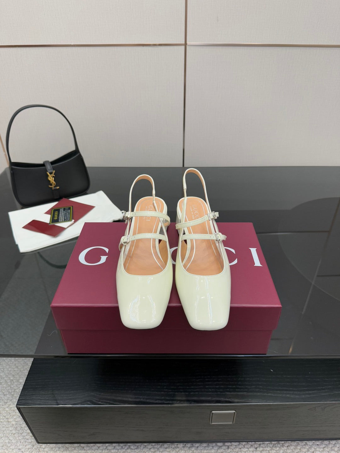 Gucci ladies' white slingback shoes with pointed toe, jeweled strap, block heel.