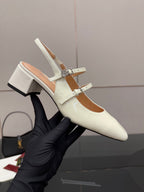 Gucci ladies' white slingback pumps with block heel and jeweled T-strap.