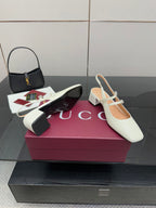 Gucci ladies' white slingback pumps with T-strap and jeweled detail, block heel.