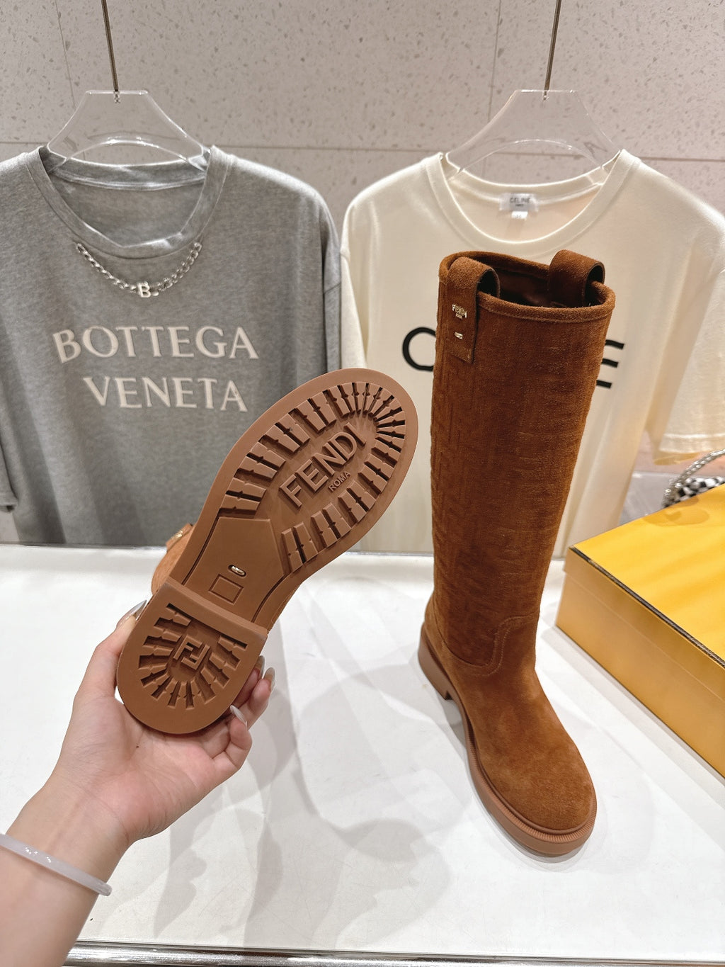 Brown boot tread sole with Fendi logo grip pattern