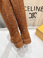 Brown suede tall boots with rear seam and stitched FF pattern, low heel