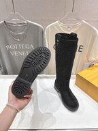 Black knee-high boot sole with Fendi logo tread and FF upper detail