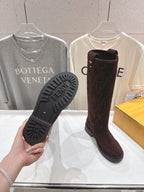 Burgundy tall boot showing outsole tread with Fendi logo at bottom