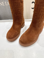 Brown Fendi mid-calf suede boots, close-up of toe and low rubber sole