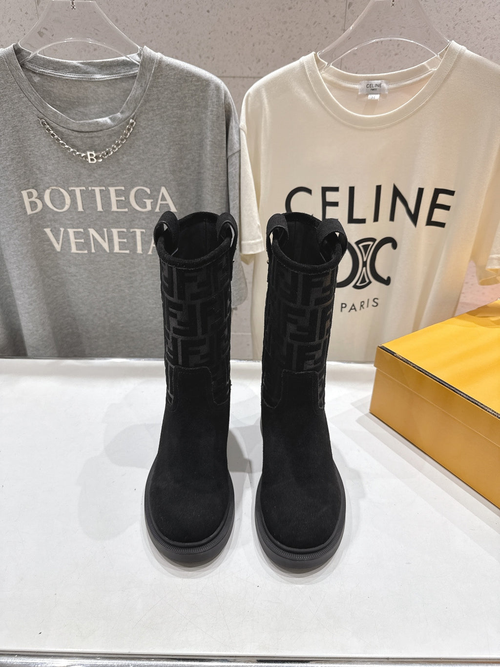 Black Fendi women's mid-calf boots with FF-pattern fabric and suede panels
