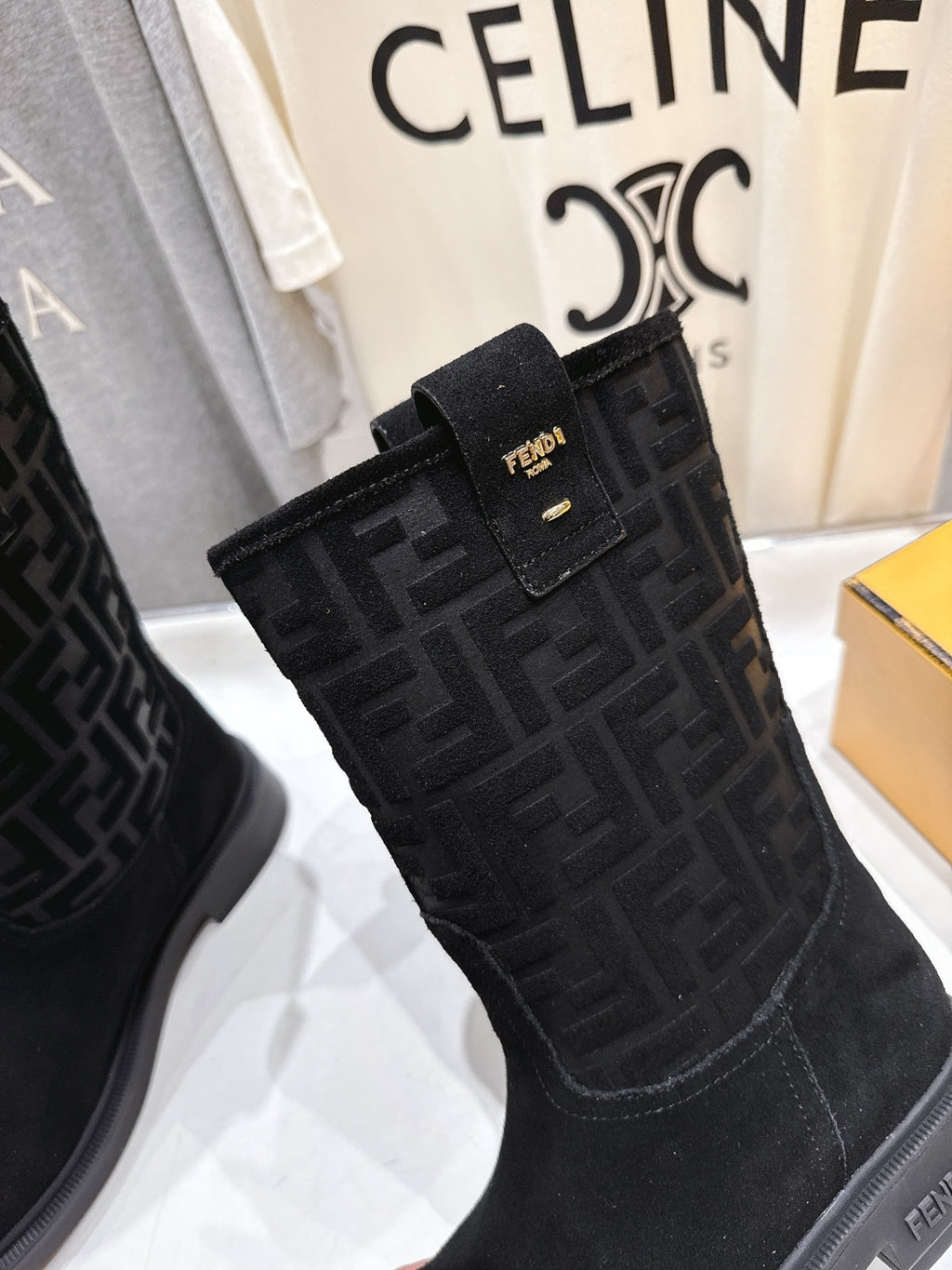 Black Fendi buckle strap boot with FF monogram shaft and gold-tone eyelets