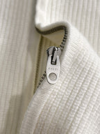 White knit sweater zipper with Gucci logo pull