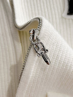 White jacket zipper pull with metal clip and short chain
