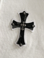 Embroidered black cross applique patch with textured details