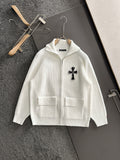 White long-sleeve zip jacket with cross applique and chest flap pockets