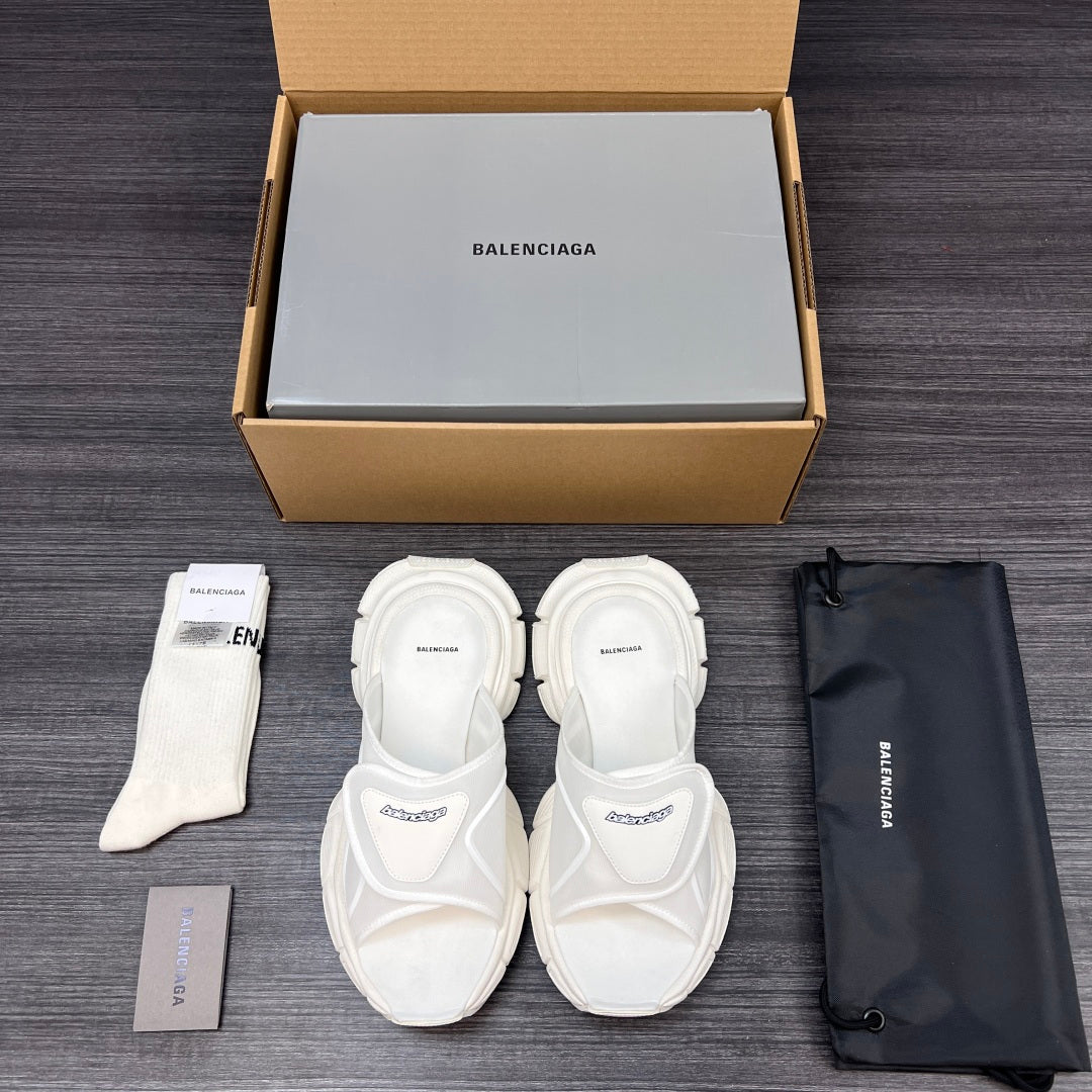Balenciaga white sporty slide sandals, pair shown side by side