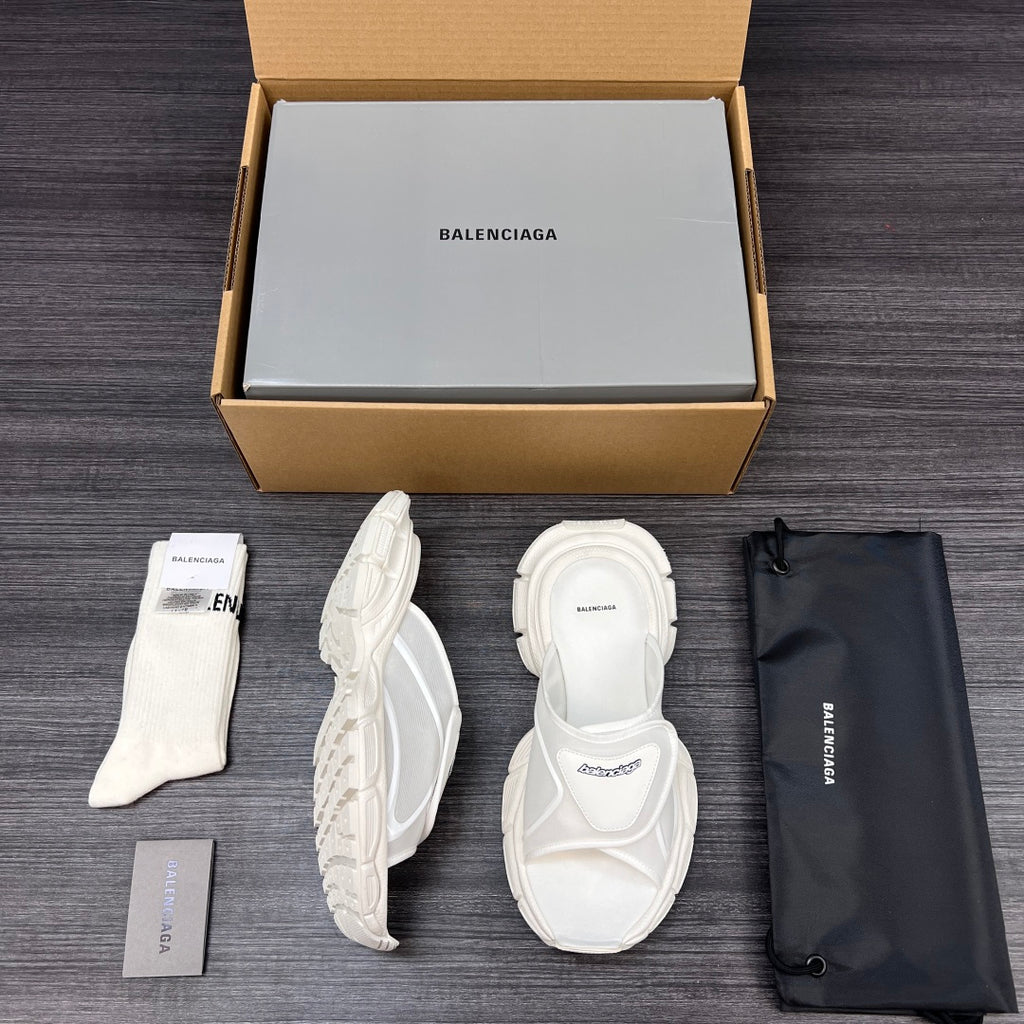 Balenciaga white sporty slide sandals, side and back views shown