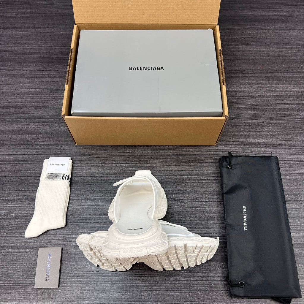 Balenciaga white sporty slide sandals, outsole and top strap visible