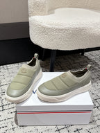 Moncler slip-on sneakers in light olive with elastic gore and textured rubber sole.