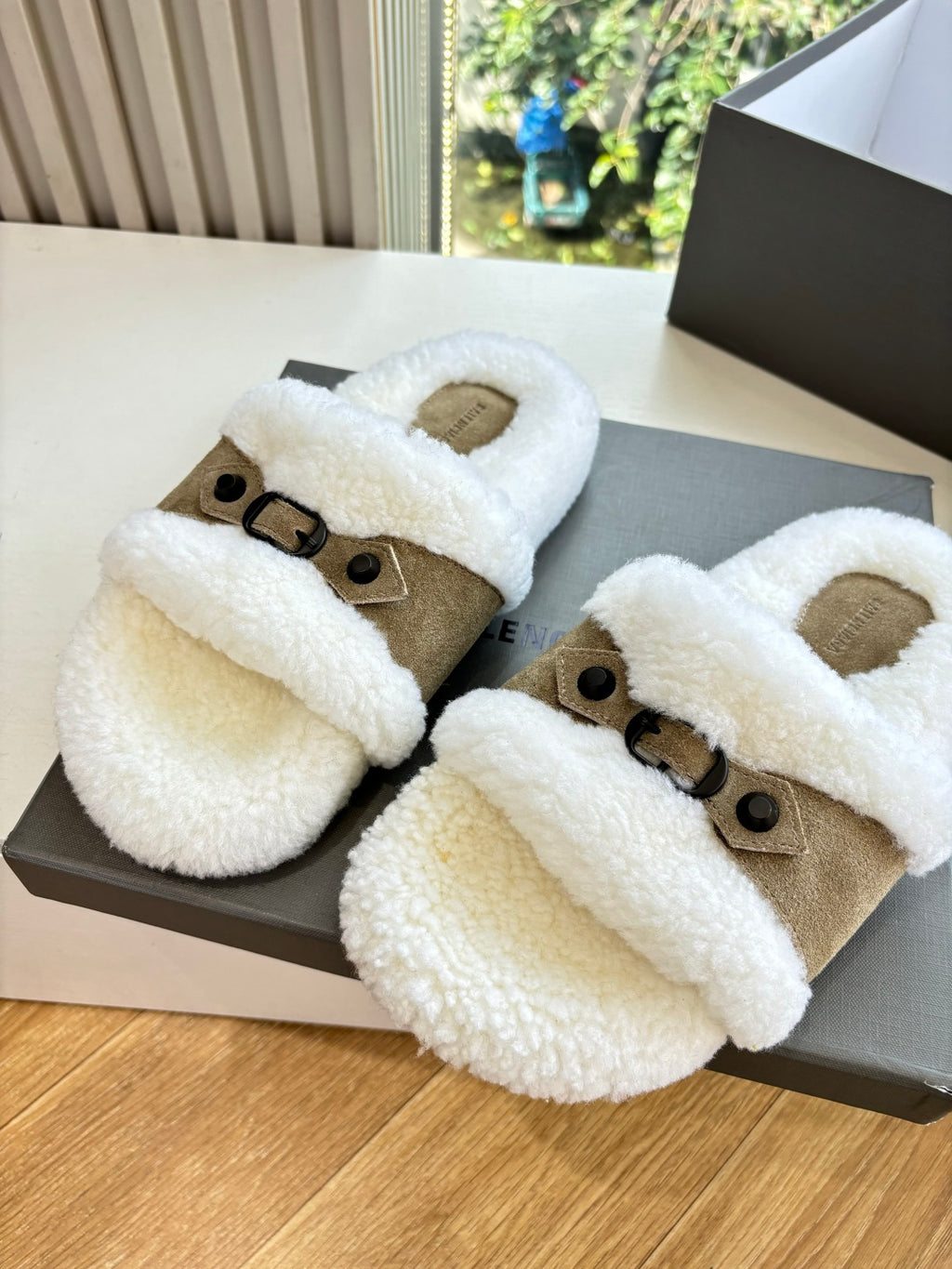 Balenciaga women’s plush slide sandals with tan suede straps and buckle detail