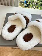 Women's sherpa slide sandals with brown suede oval patch at front