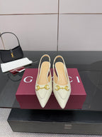 Cream pointed-toe low heel shoes with gold horsebit detail