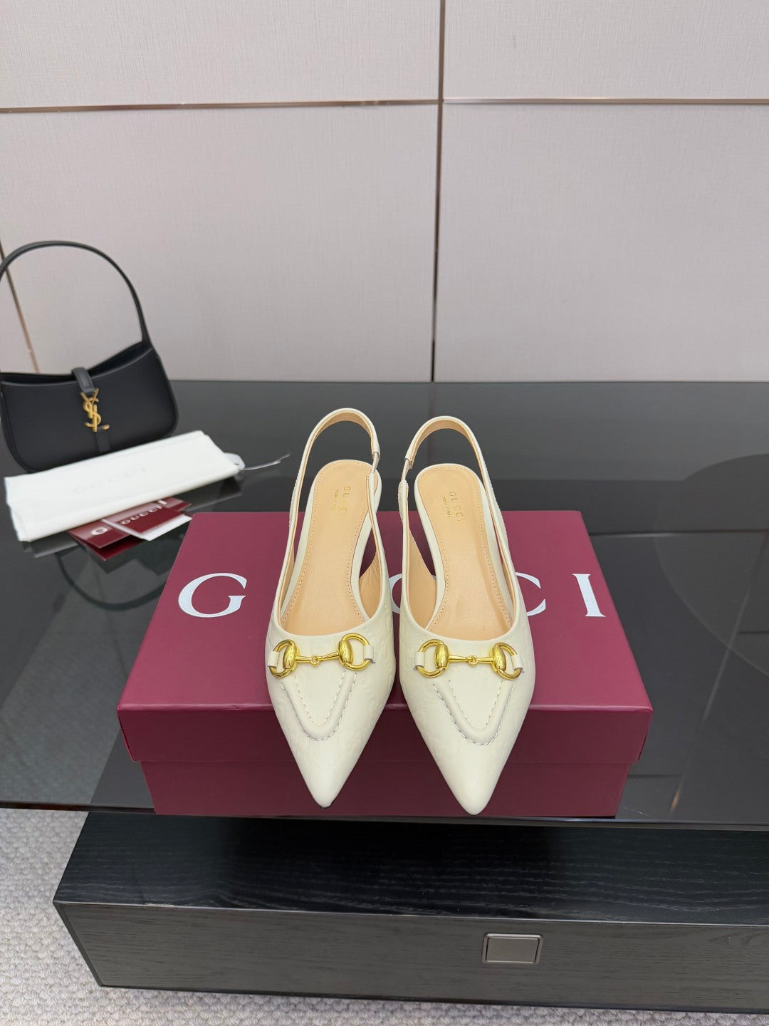 Cream pointed-toe low heel shoes with gold horsebit detail