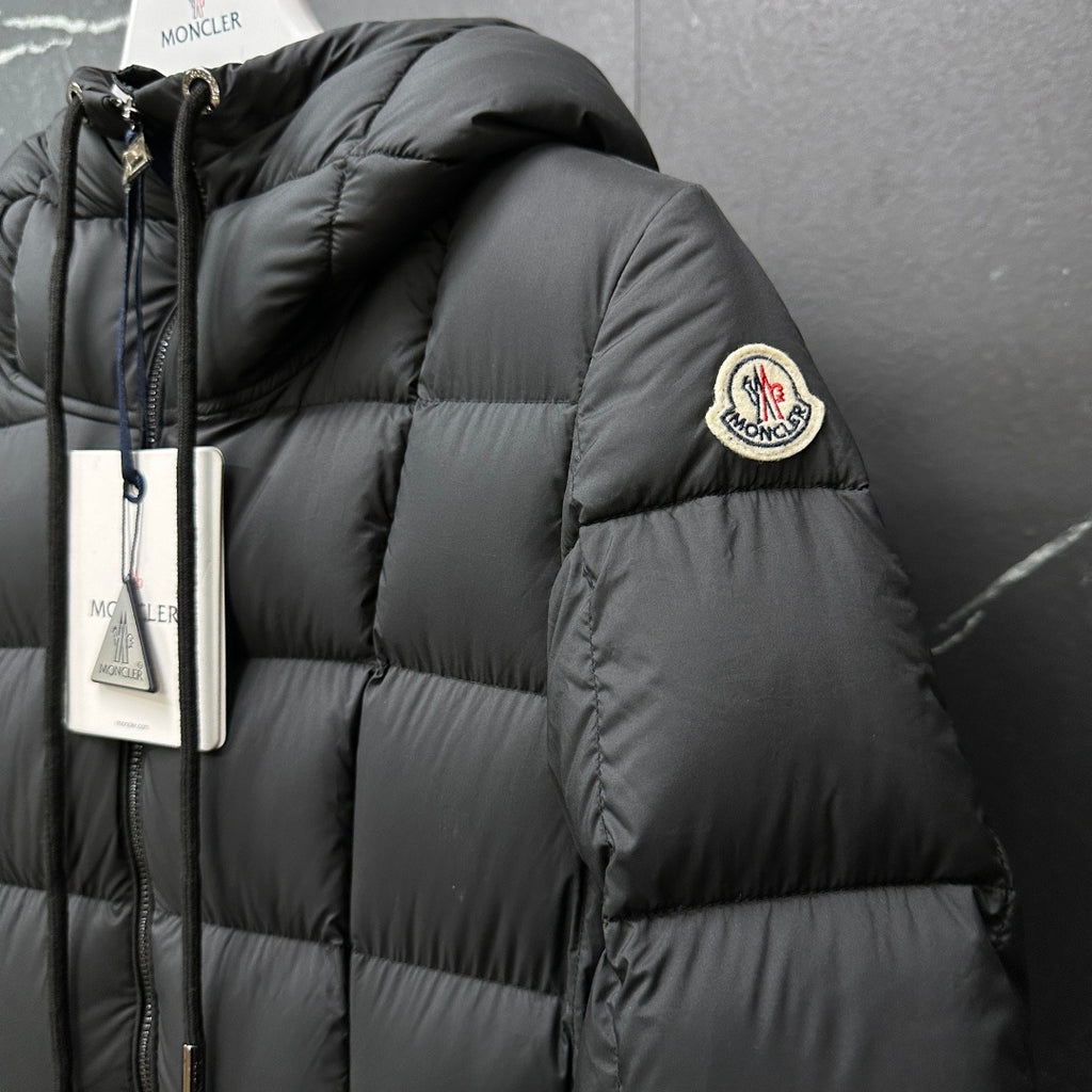 Moncler long puffer coat, dark gray, sleeve badge and quilted shoulder close-up
