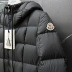 Moncler long puffer coat, dark gray, sleeve badge and quilted shoulder close-up