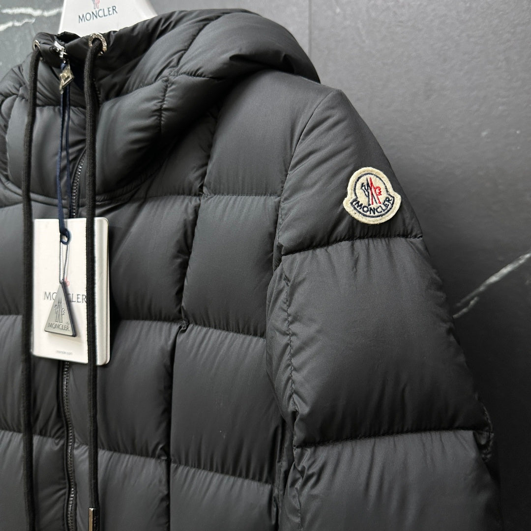Moncler long puffer coat, dark gray, sleeve badge and quilted shoulder close-up