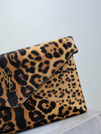 YSL leopard-print flap shoulder bag close-up with gold trim