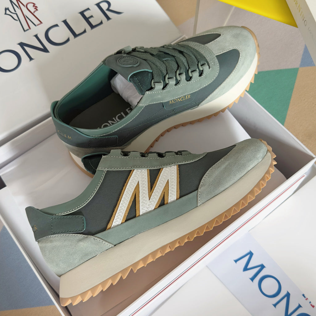Moncler sneakers pair in sage and dark green with lace-up front and chunky rubber sole