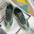 Moncler lace-up sneakers in sage and dark green with suede panels and rubber sole