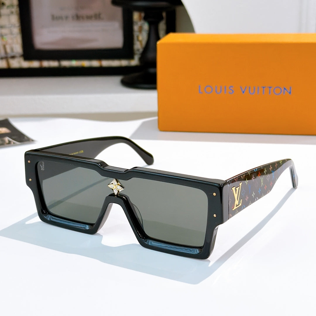 Dark square sunglasses with star bridge emblem and gold-tone logo temple detail