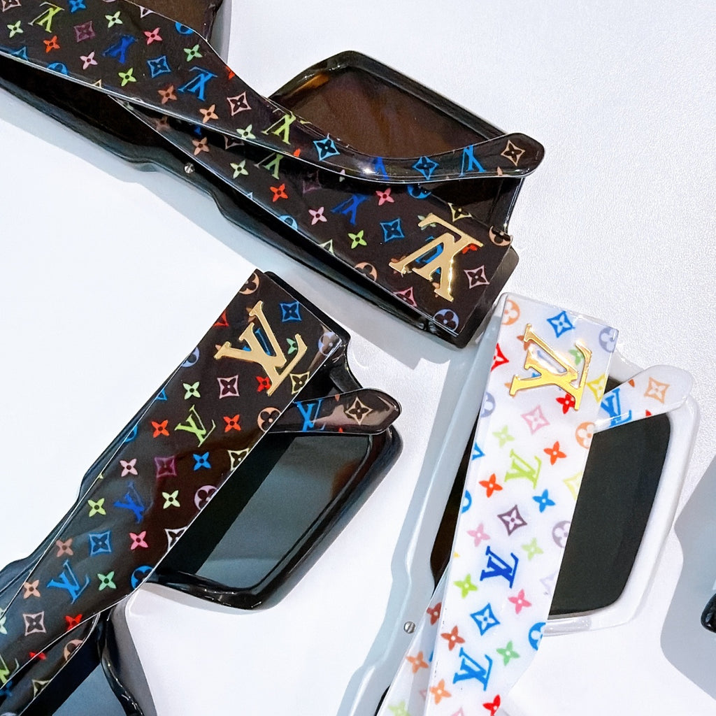 Multicolor monogram sunglasses with star-shaped bridge emblem and glossy black frame