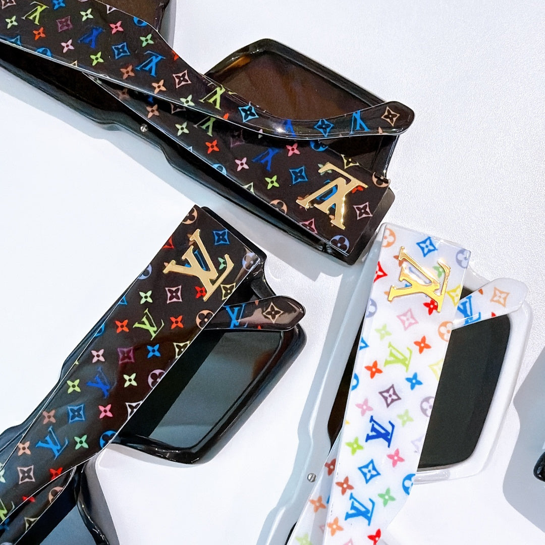 Multicolor monogram sunglasses with star-shaped bridge emblem and glossy black frame
