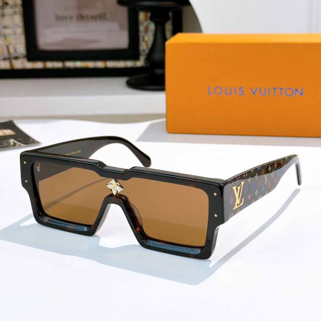 Black square sunglasses with star-shaped bridge emblem and multicolor logo temple