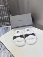 Faux shearling slide sandals with dark ankle strap and open toe, white