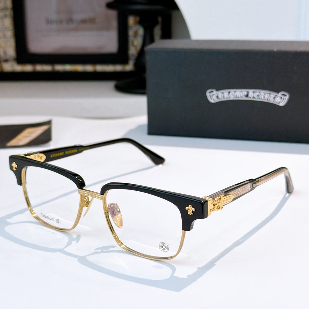 Black and gold eyeglasses with clear lenses, star accents