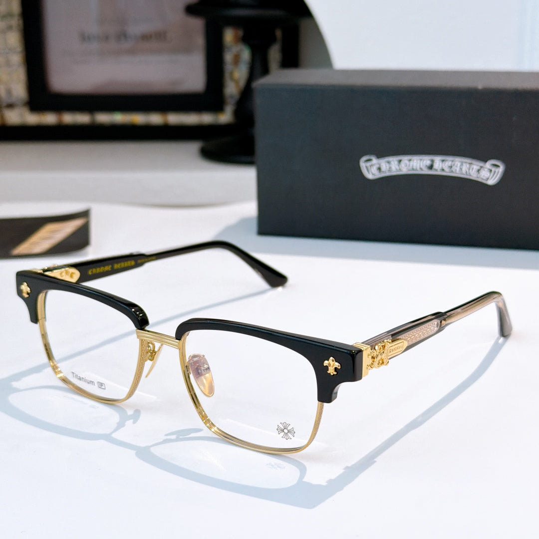 Black and gold eyeglasses with clear lenses, star accents